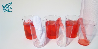 Sciensation hands-on experiment for school: A wick game ( chemistry, water, capillary action)